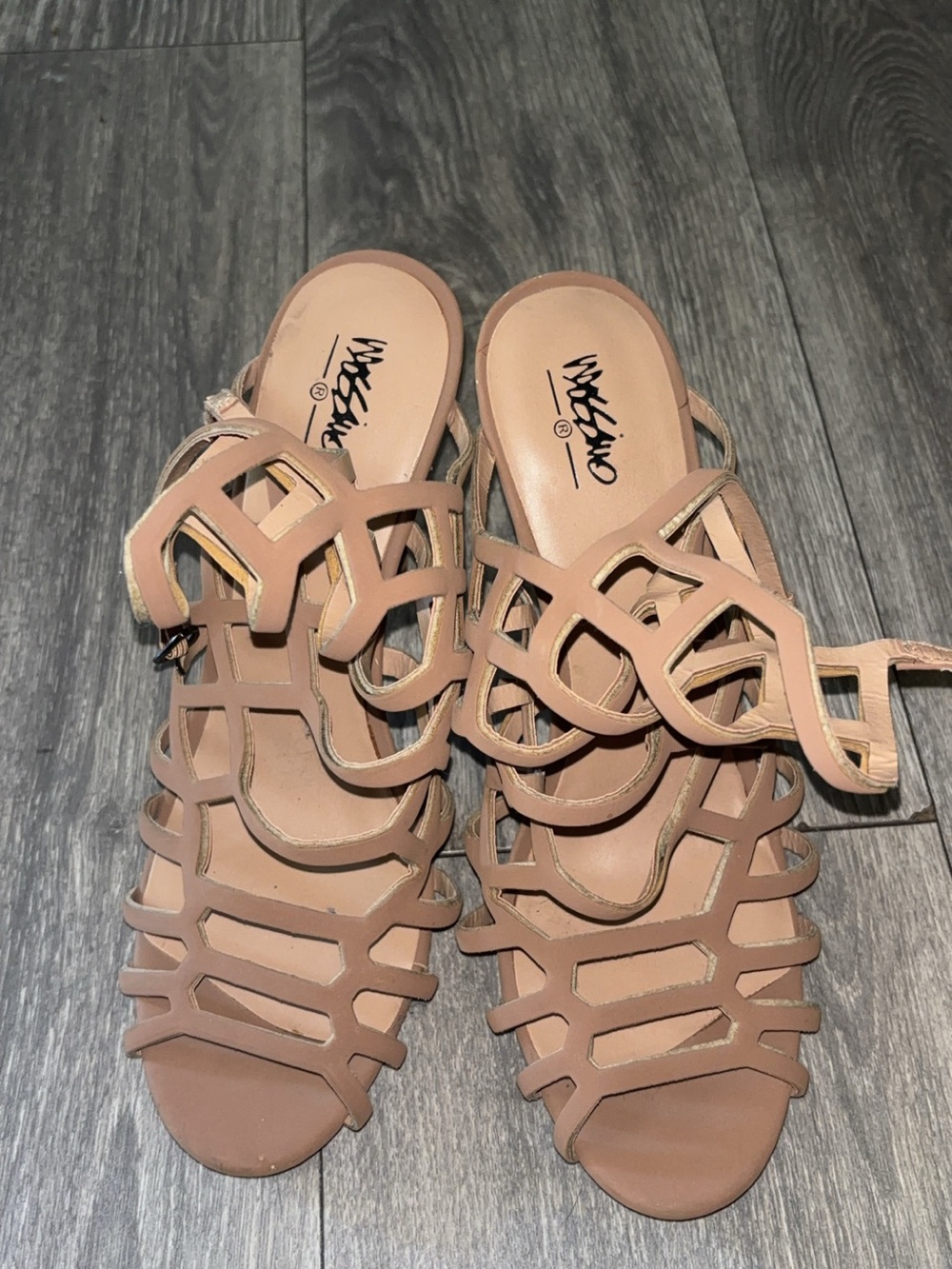 Worn strappy smelly heels